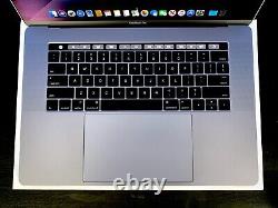 Apple MacBook Pro 15 512GB SSD 16GB Touch Bar 3.9ghz i7 Space Gray Warranty translated in French is: Apple MacBook Pro 15 512GB SSD 16GB Touch Bar 3.9ghz i7 Gris sidéral Garantie