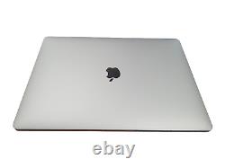 Lire Apple MacBook Pro 15 (Intel Core i7 2.6Ghz, 16 Go, 512 Go, Radeon 560x) Argent